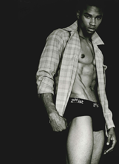 Man in shirt and black boxers