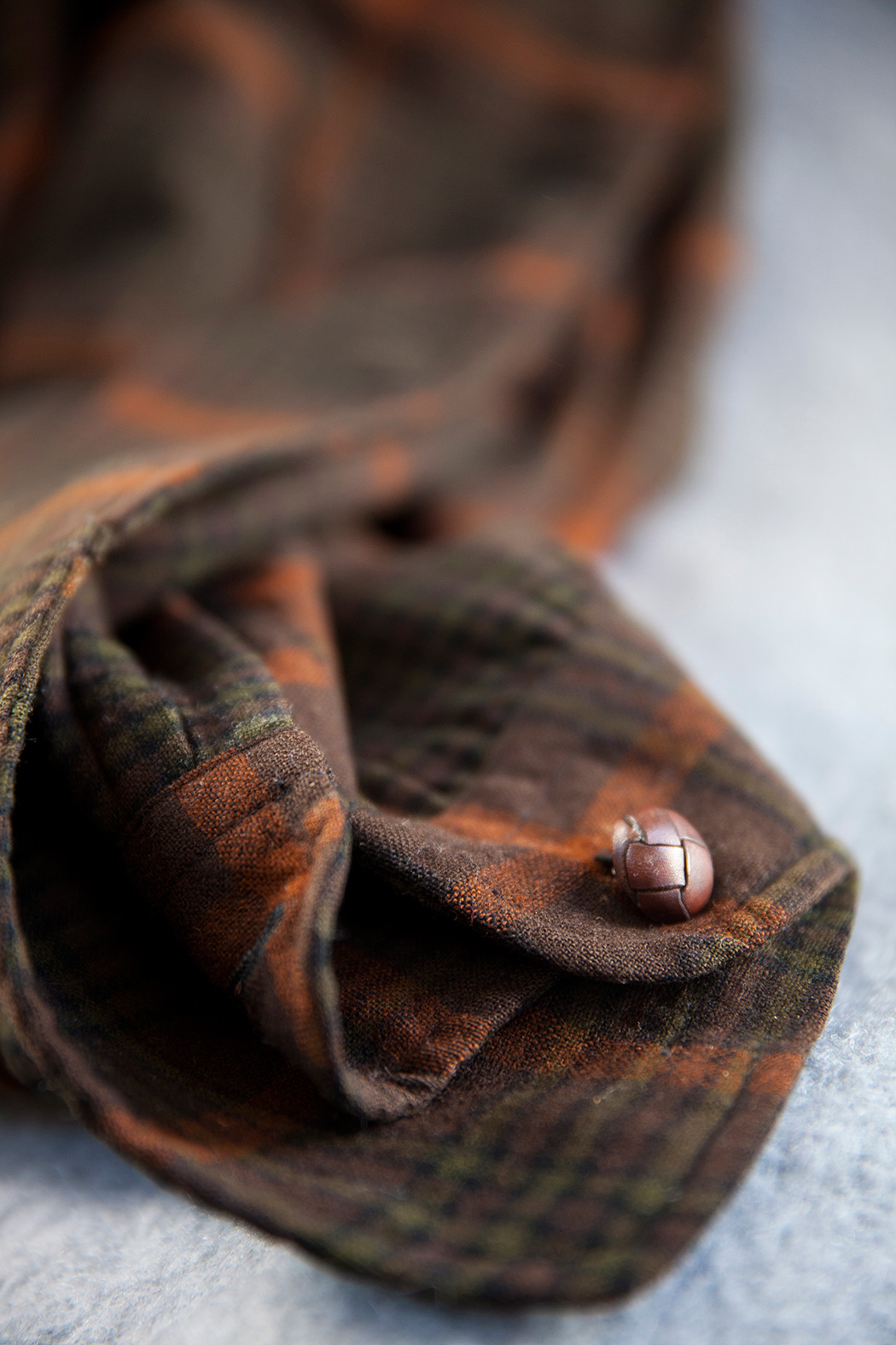 Shirt sleeve and button