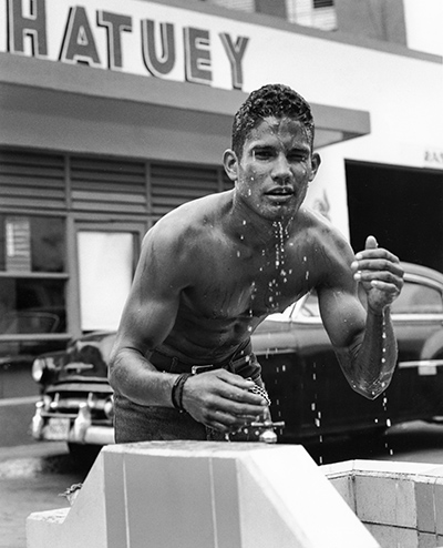 Boy at water fountain