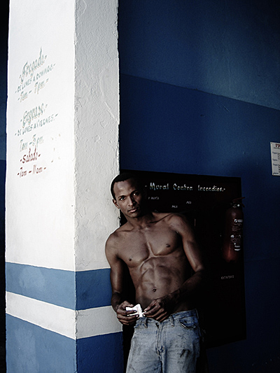 Man leaning on wall