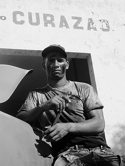 Man with motor oil on face