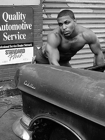 Man leaning on car