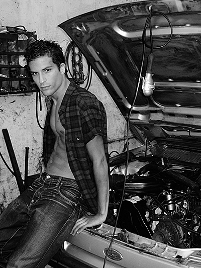 Man leaning on car