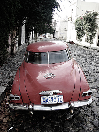 Reddish car, rear view