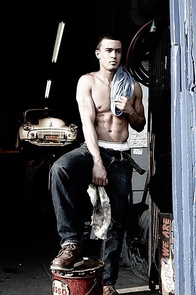 Man with shirt over shoulder